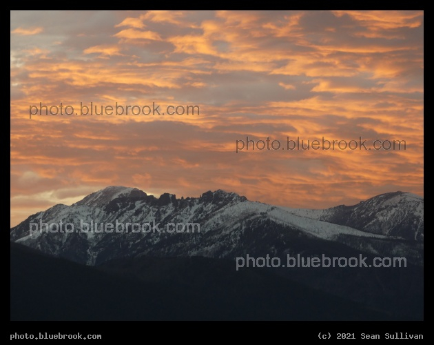 Snowy Mountains under Peach Sky - Corvallis MT
