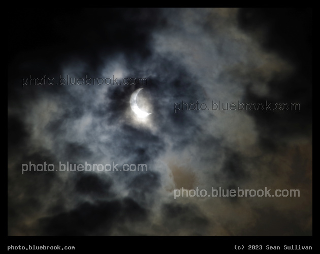 Eclipse through Clouds (Middle) - Partial solar eclipse on 14 October 2023, Corvallis MT